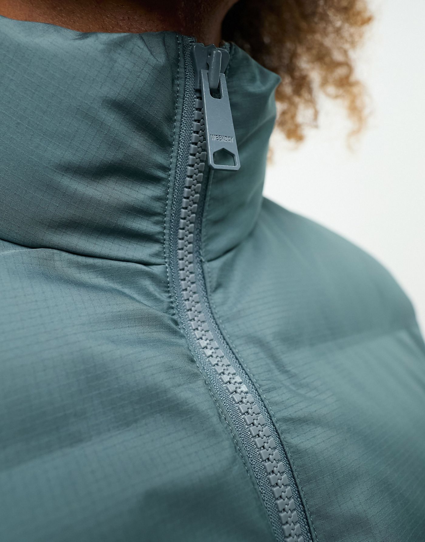 Weekday Unisex Kip puffer vest in slate blue exclusive to ASOS