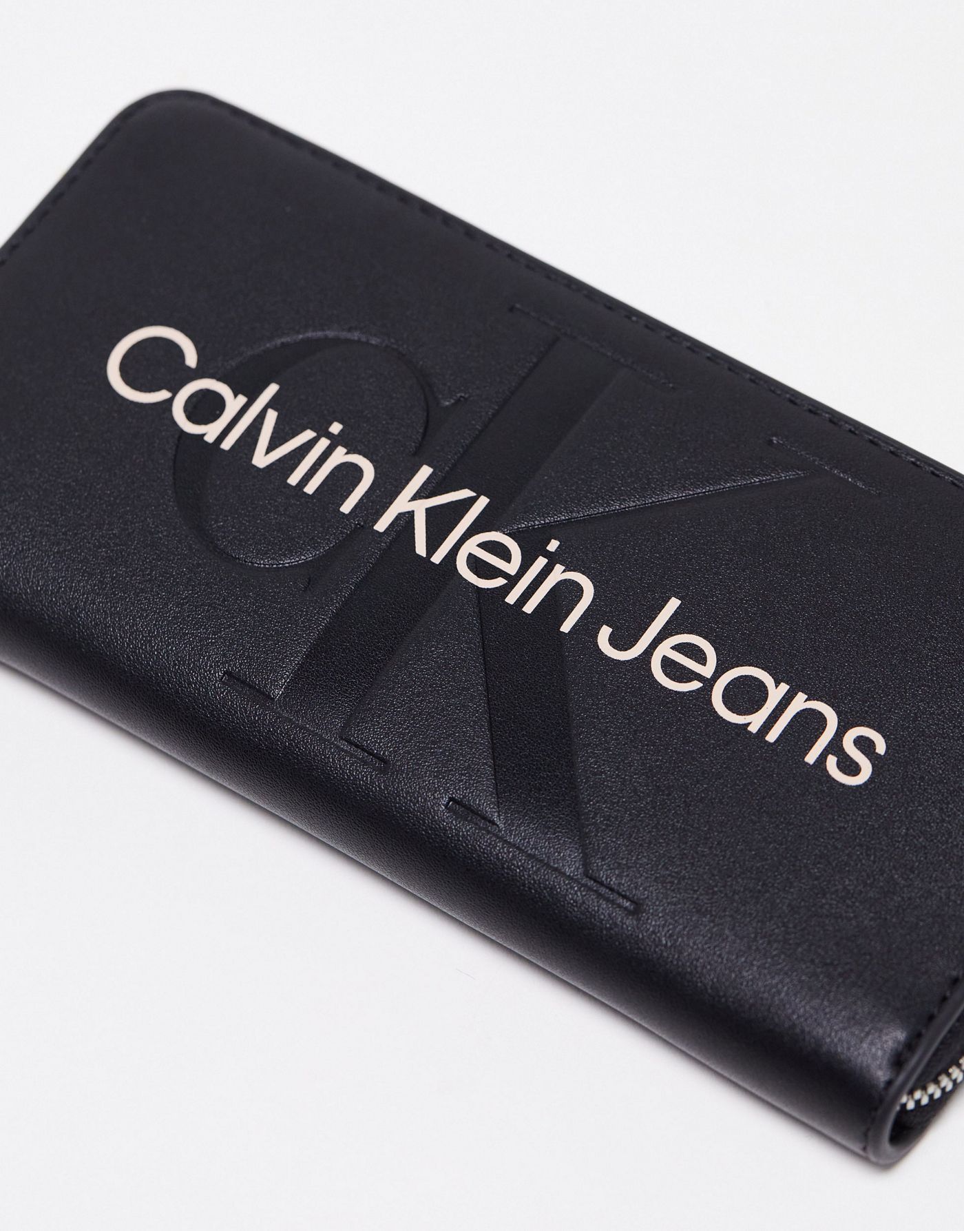 CK Jeans sculpted zip around mono wallet in black