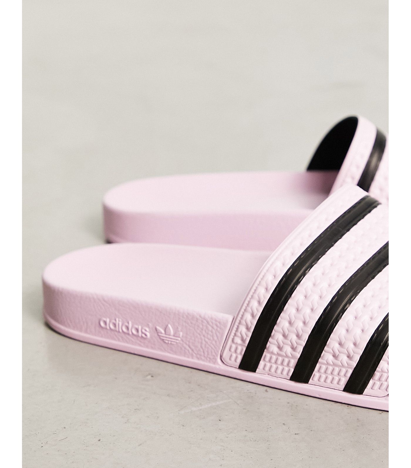 adidas Originals Adilette sliders in light pink
