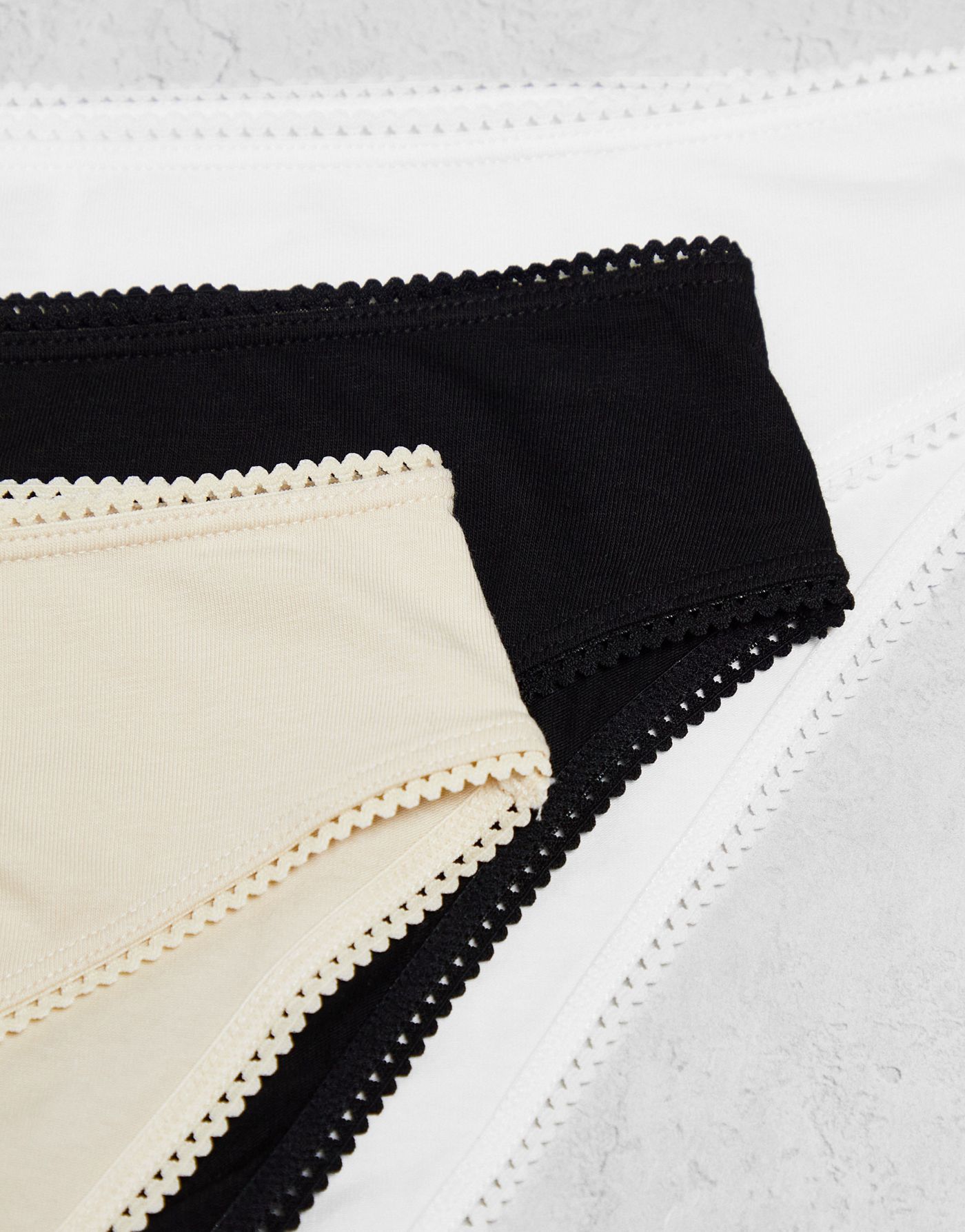 Monki 3 pack briefs in black, white and beige