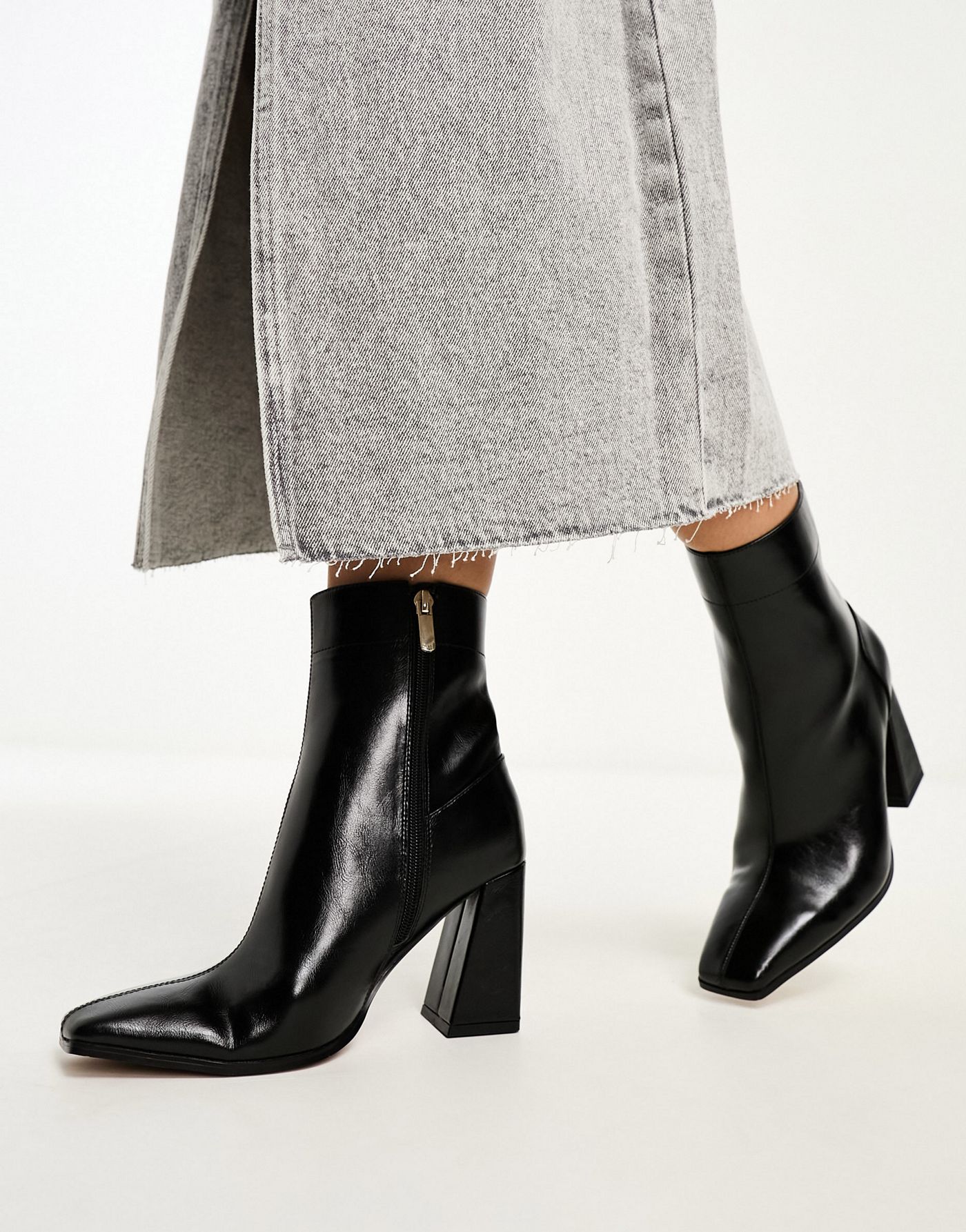 ASOS DESIGN Wide Fit Everest flared heel boots in black