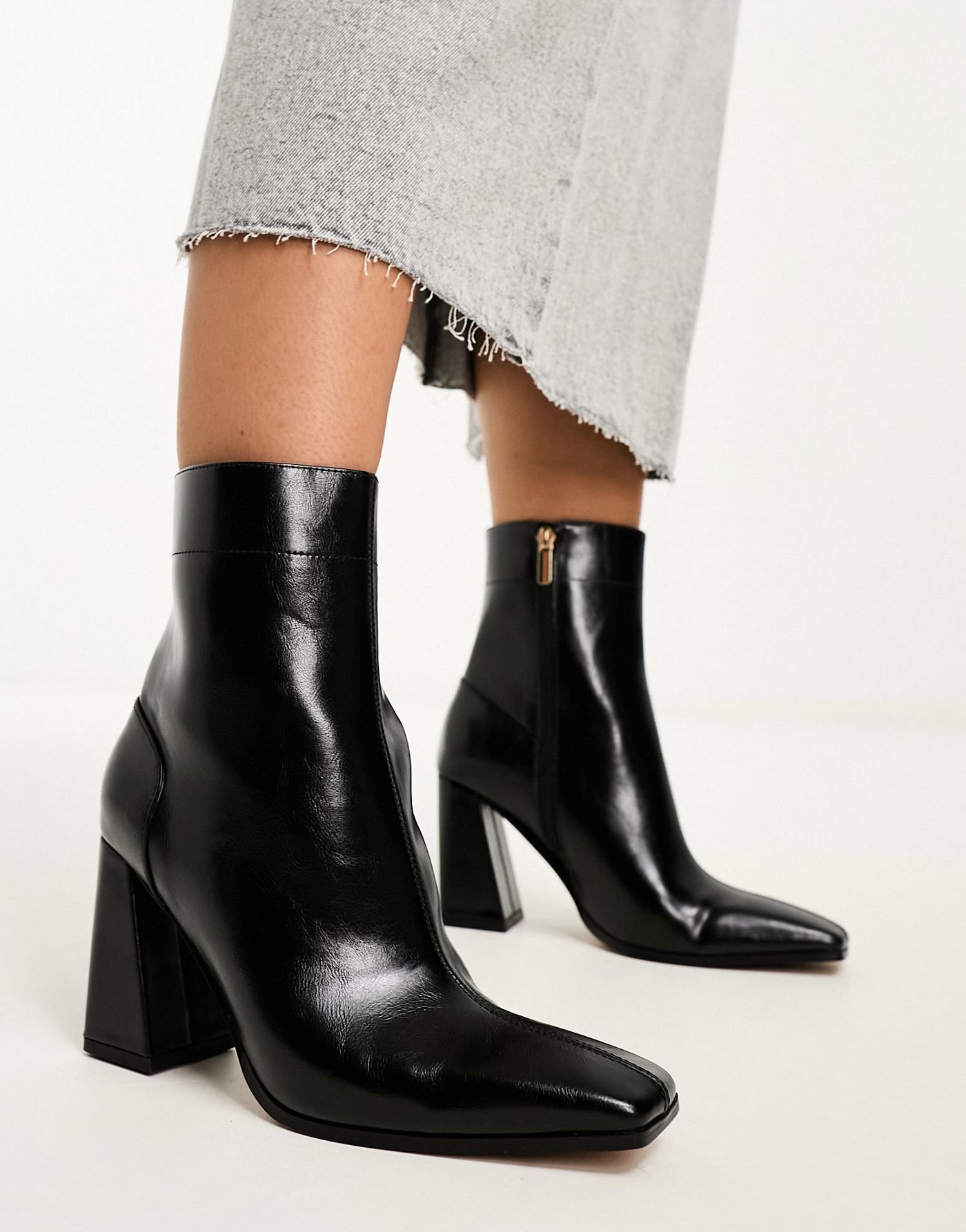 ASOS DESIGN Wide Fit Everest flared heel boots in black