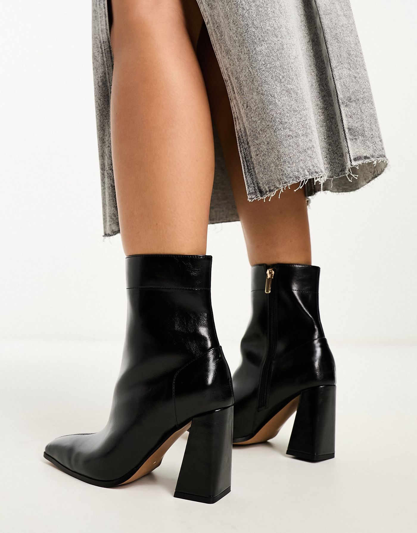 ASOS DESIGN Wide Fit Everest flared heel boots in black