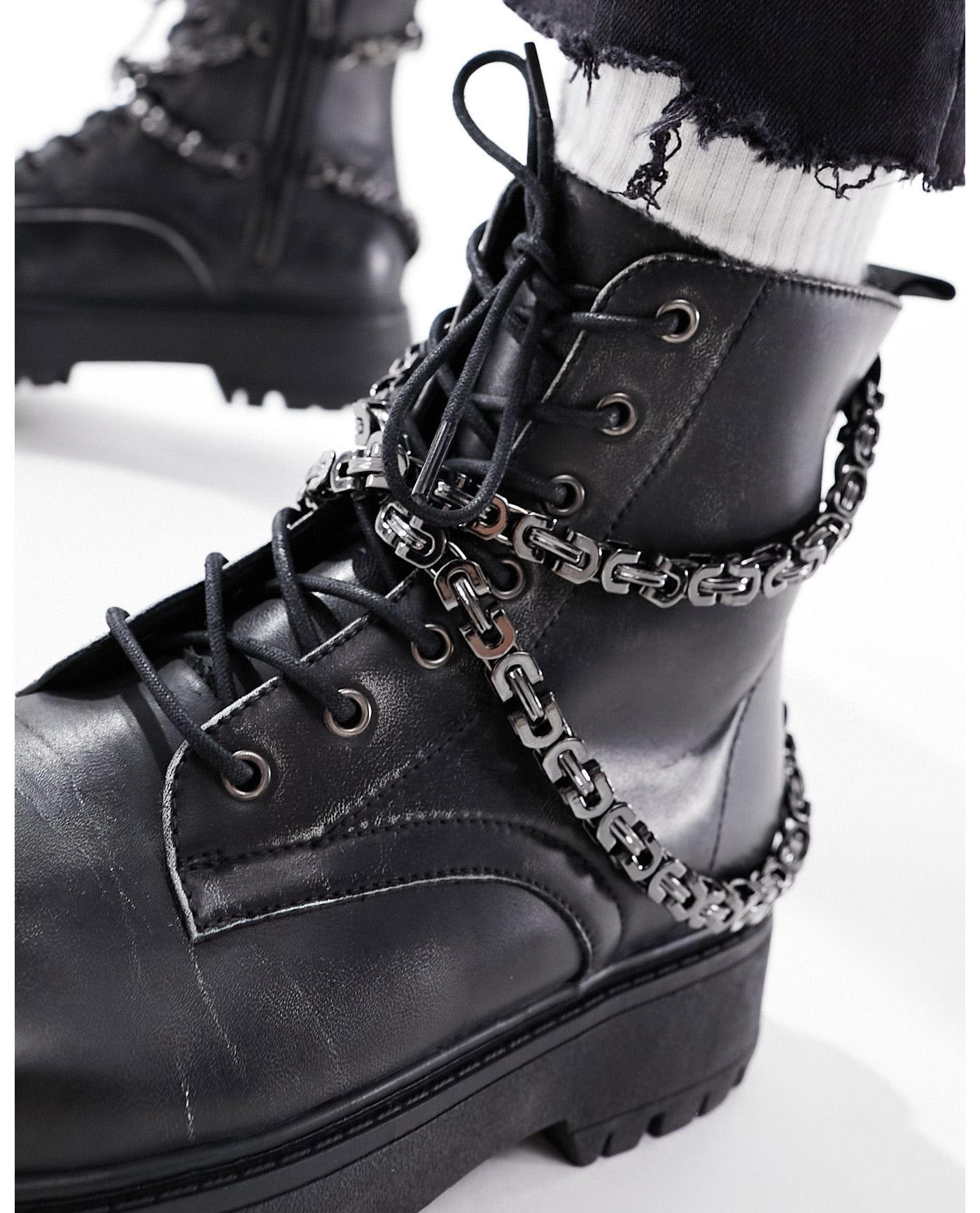 ASOS DESIGN lace up boot in black faux leather with chunky sole and studs