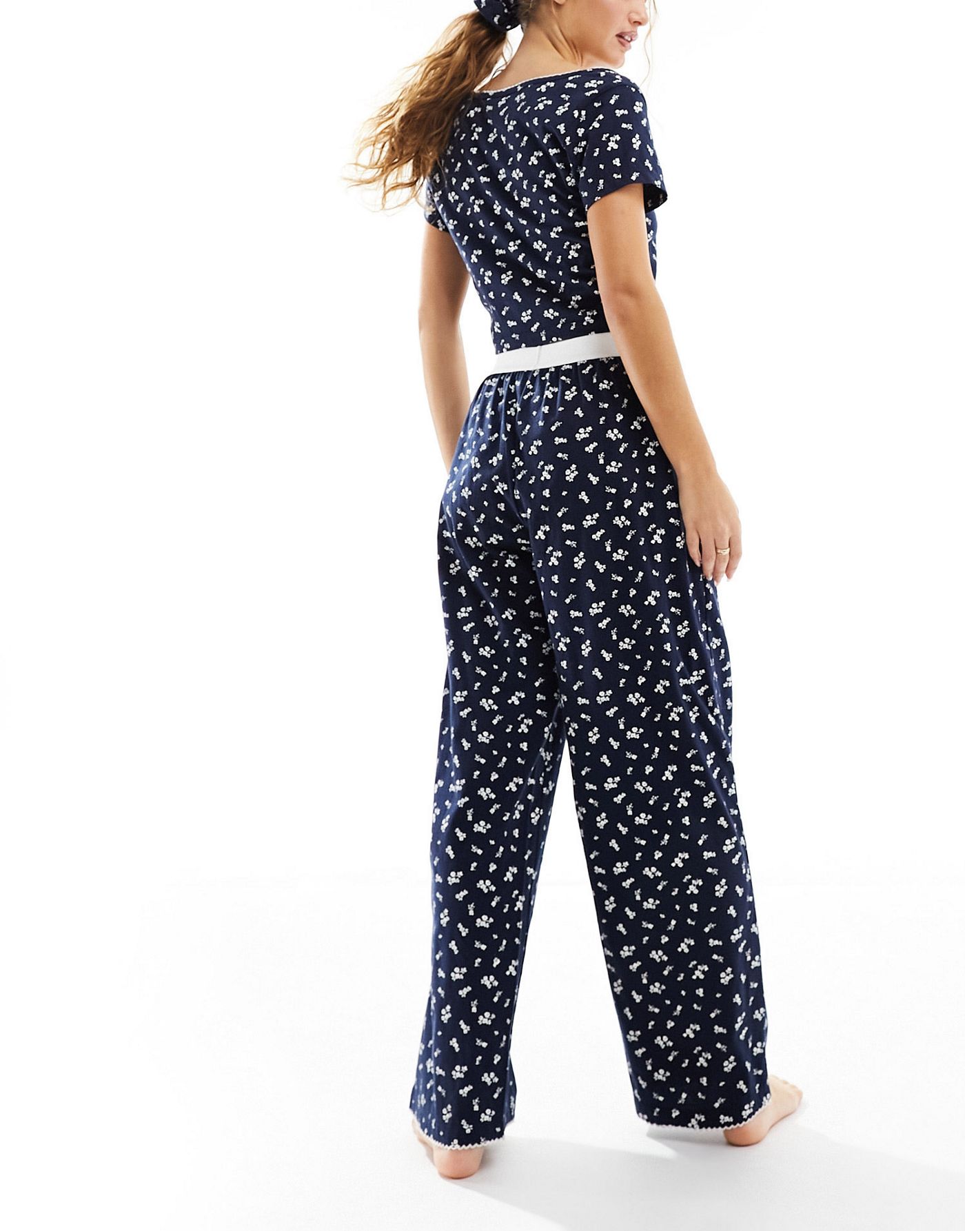 ASOS DESIGN Petite mix & match ditsy print pyjama trouser with exposed waistband and picot trim in navy