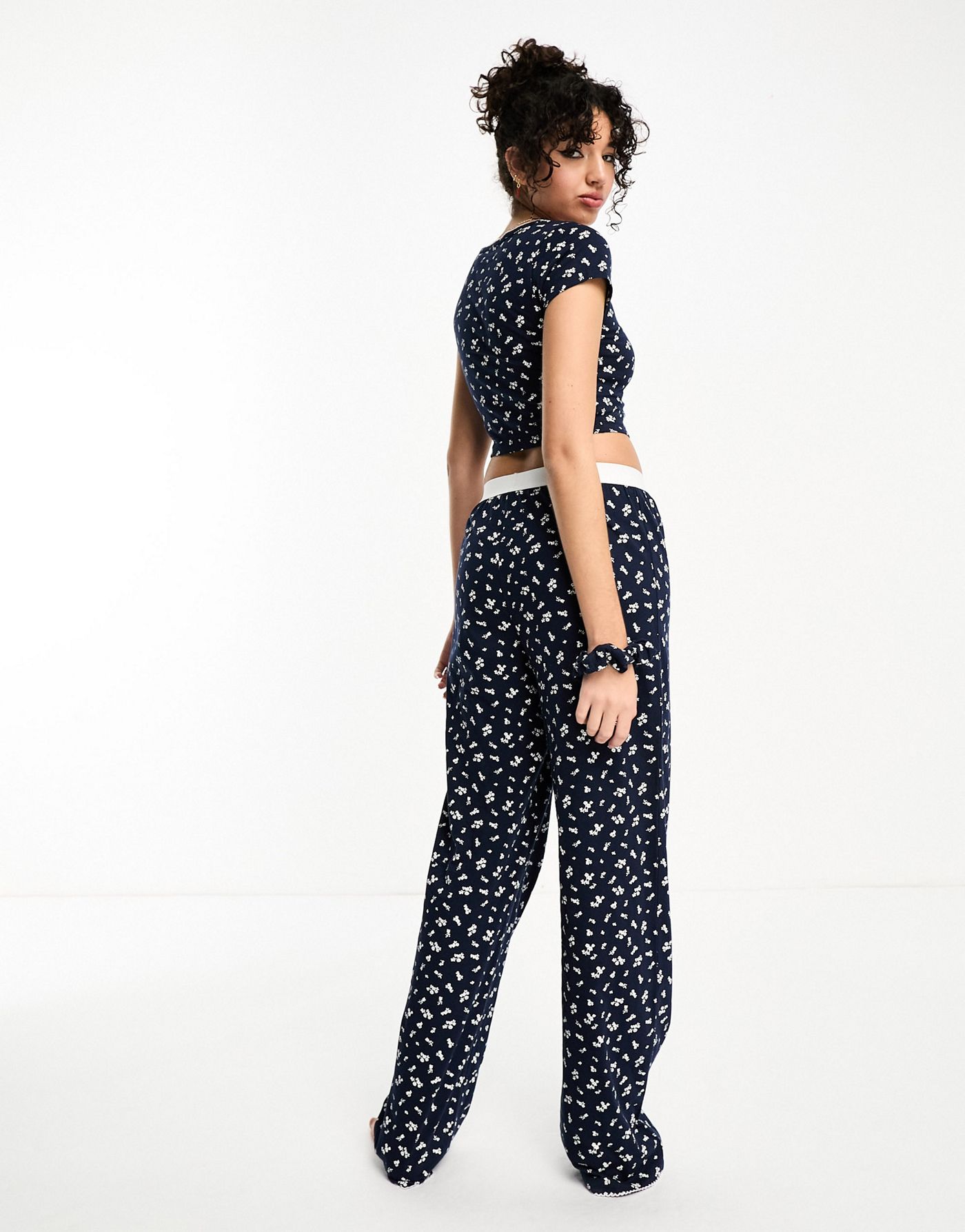 ASOS DESIGN Tall mix & match ditsy print pyjama trouser with exposed waistband and picot trim in navy