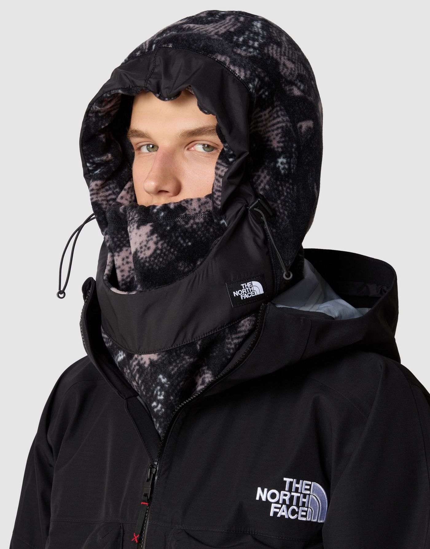 The North Face Whimzy powder hood in fawn grey snake charmer print