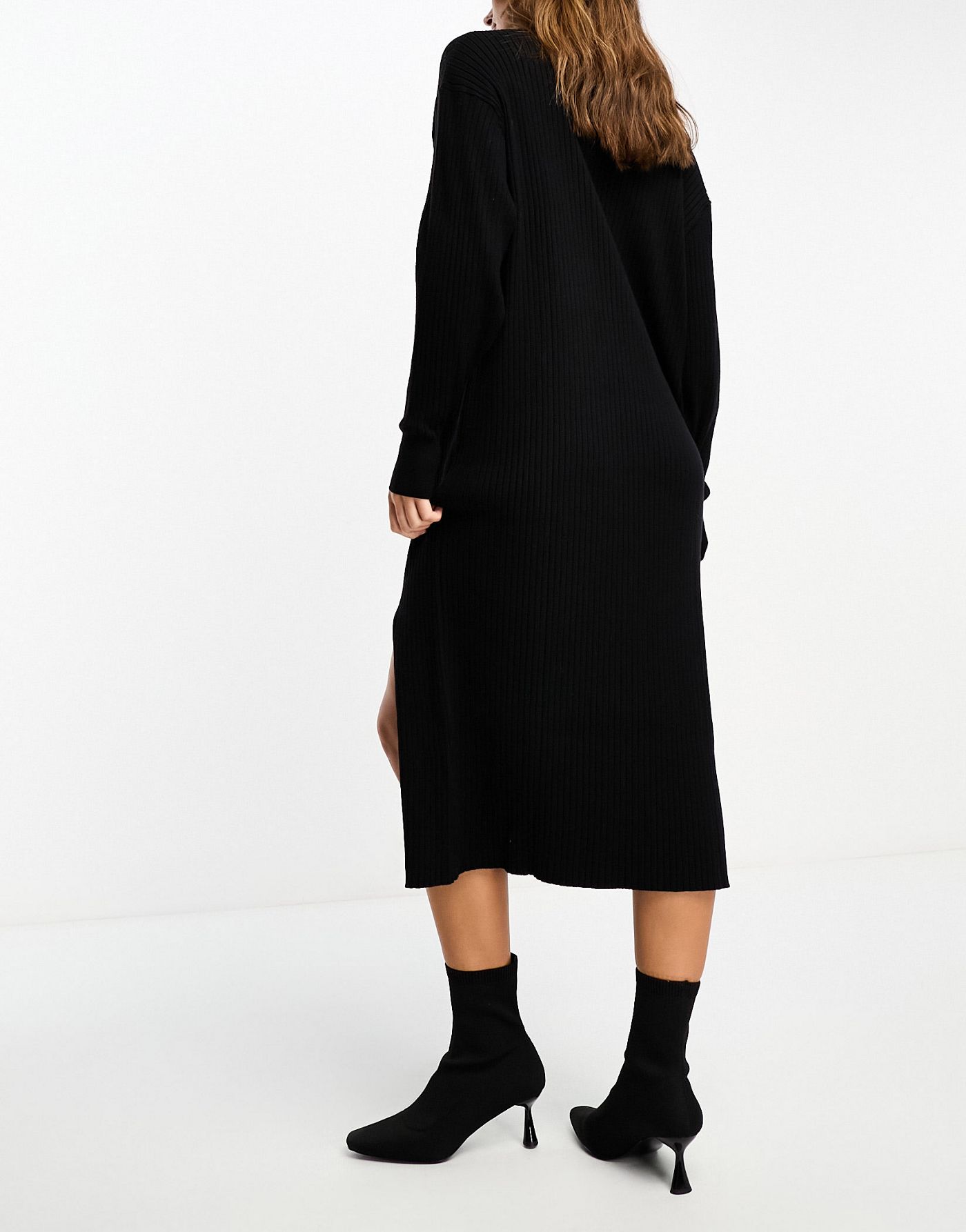 Edited long sleeve knitted midaxi dress with split in black