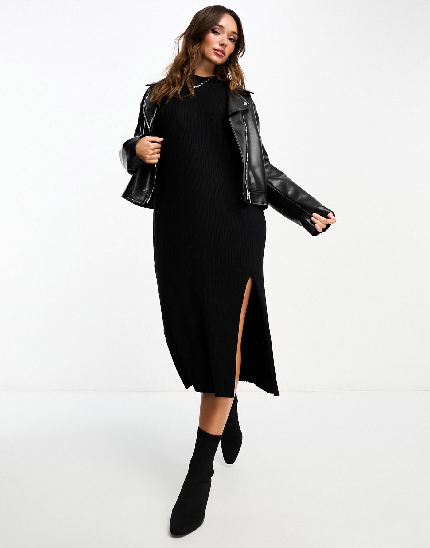 Edited long sleeve knitted midaxi dress with split in black