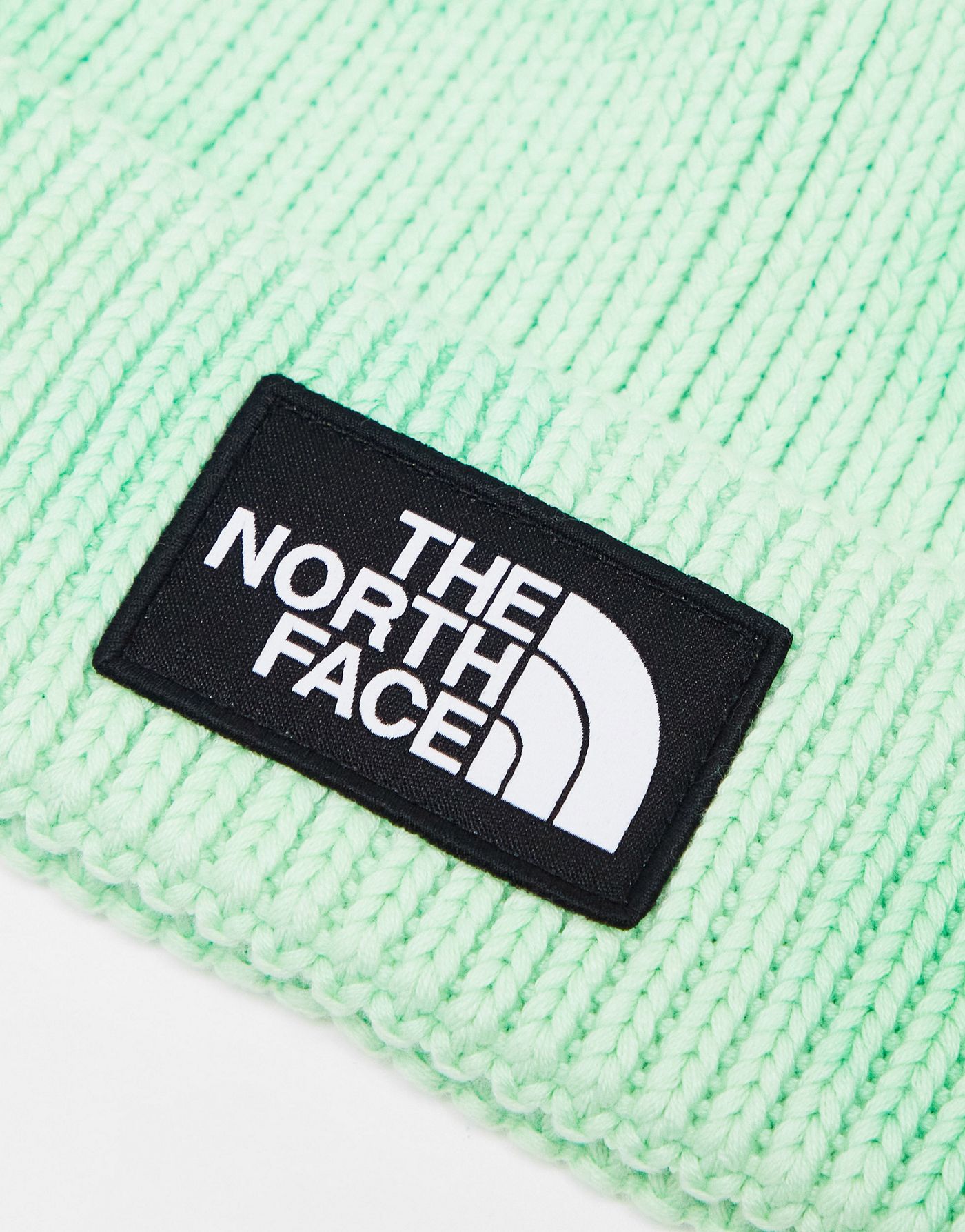 The North Face Logo patch cuffed beanie in green tie dye