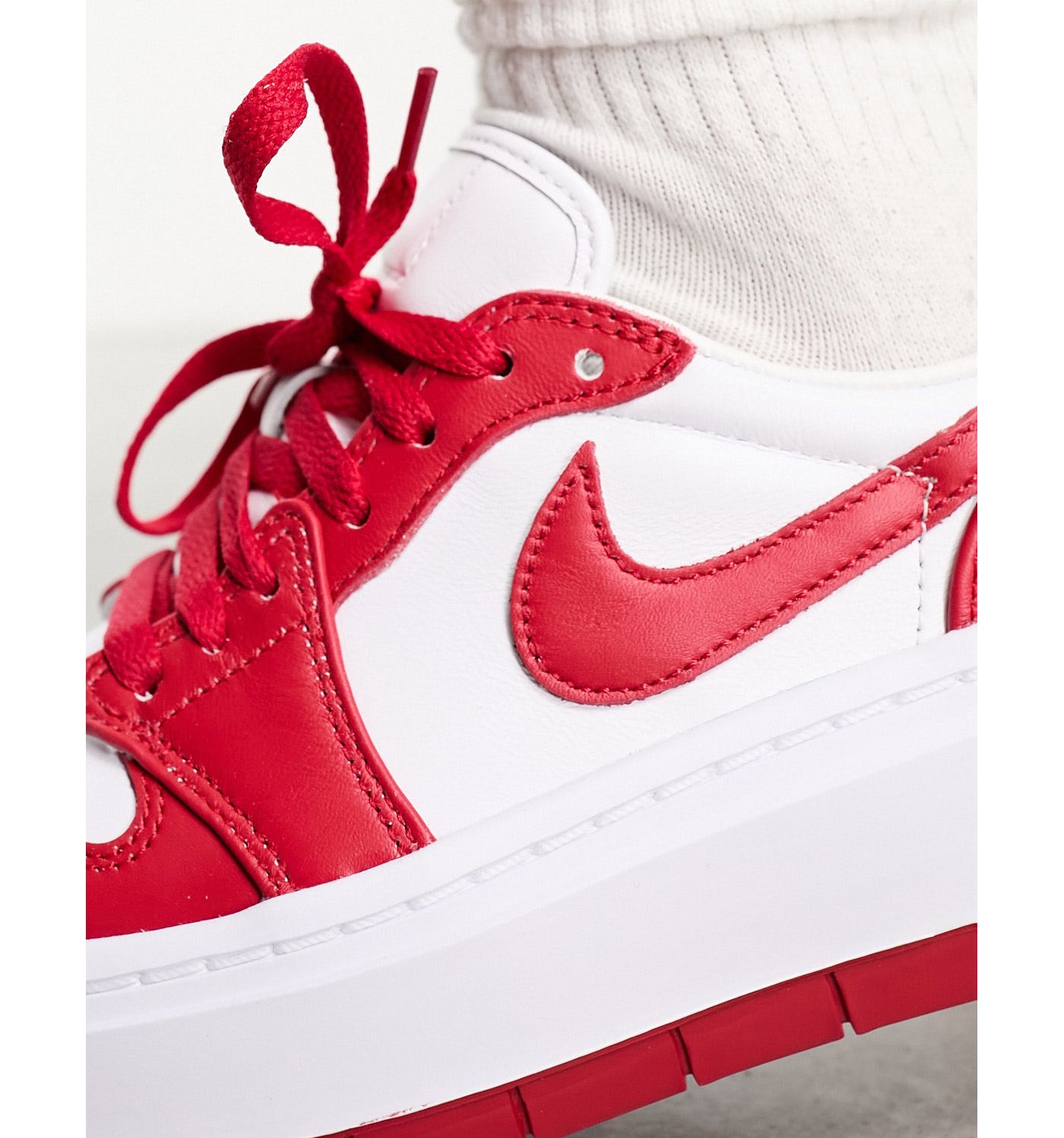 Air Jordan 1 Elelvate low trainers in white and fire red