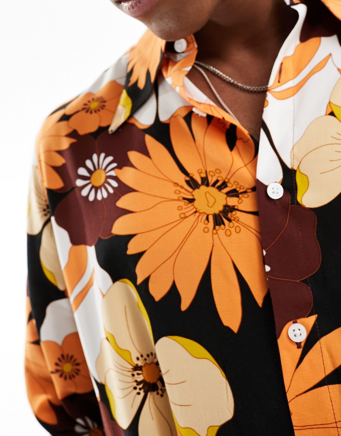 ASOS DESIGN relaxed shirt with 70s collar in orange and brown floral print