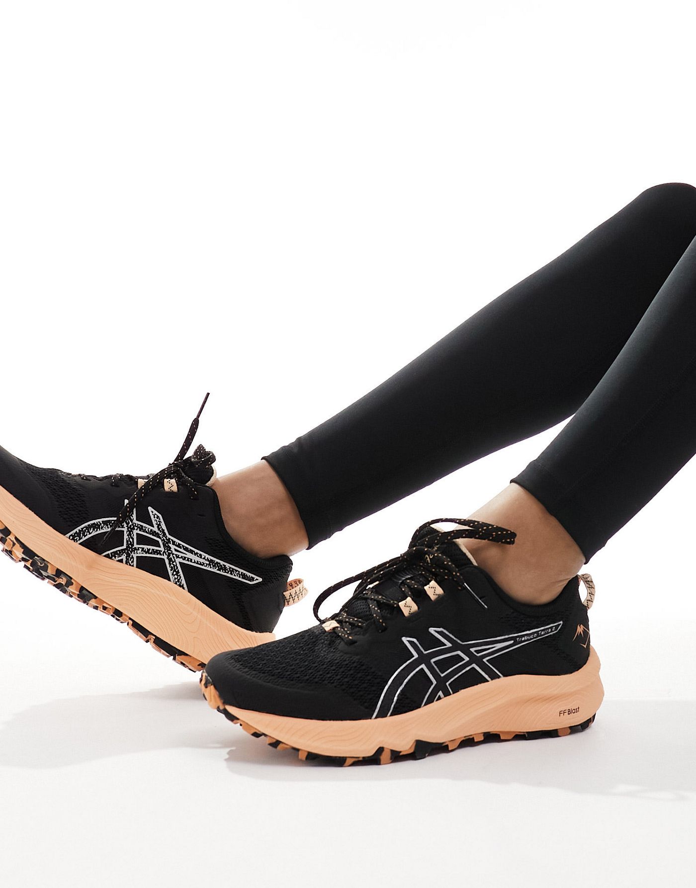Asics Trabuco Terra 2 trail running chunky sole trainers in black and peach